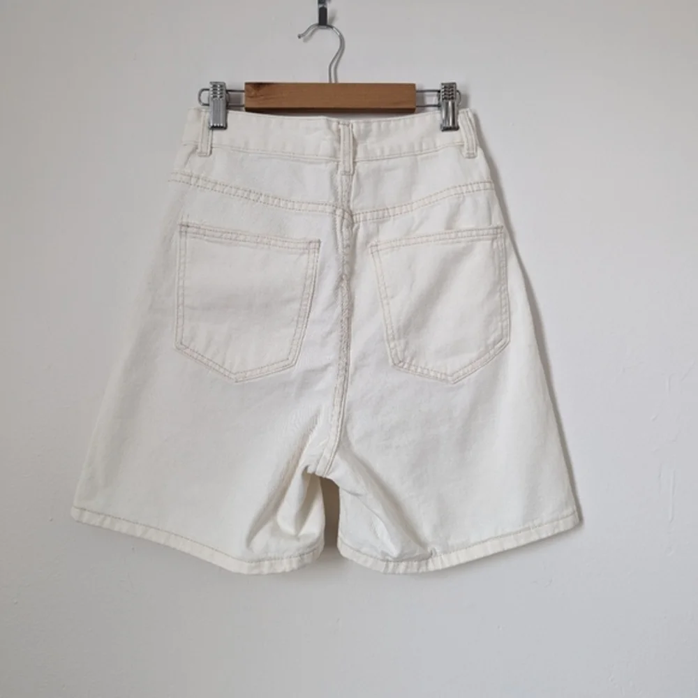 NWT‎ 12th Tribe bone off white ivory asymmetric crisscross Dylan denim shorts